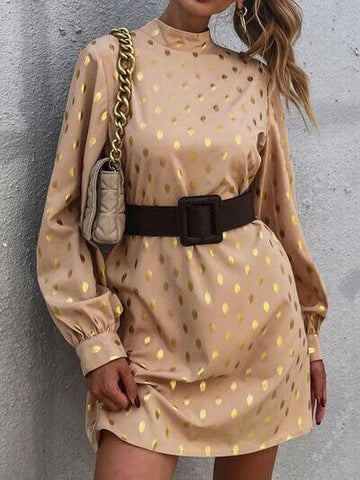 Fashionable beige dress with gold polka dots and statement belt, perfect for special occasions and trendy outings.