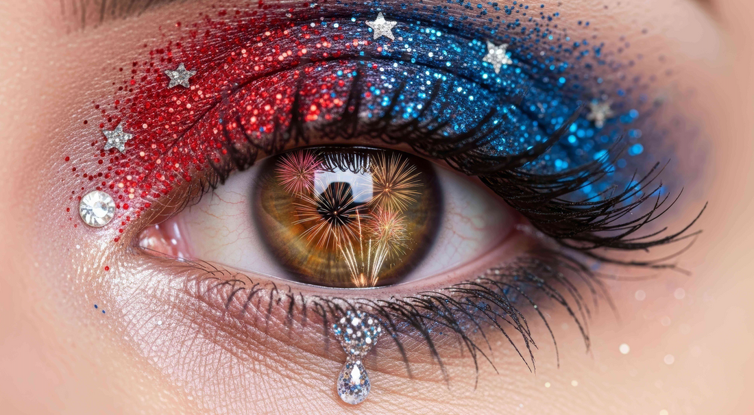 Close-up of a patriotic eye makeup design featuring blue and red glitter, representing 250th anniversary apparel.