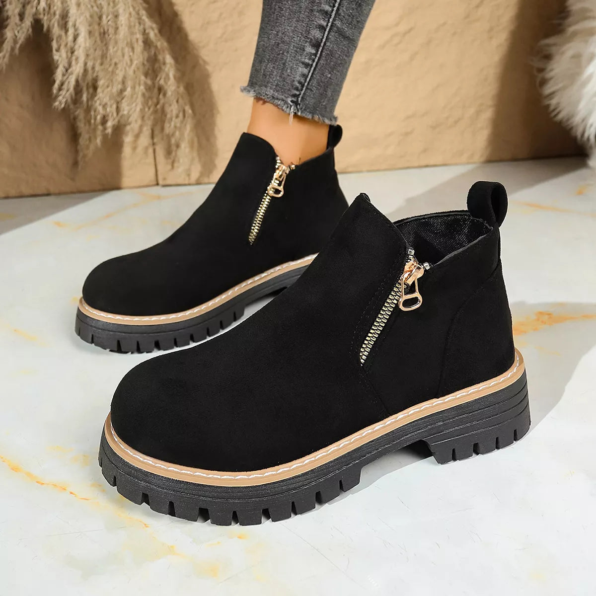 Round Toe Platform Boots in black with zipper detail and sturdy platform sole for style and comfort.