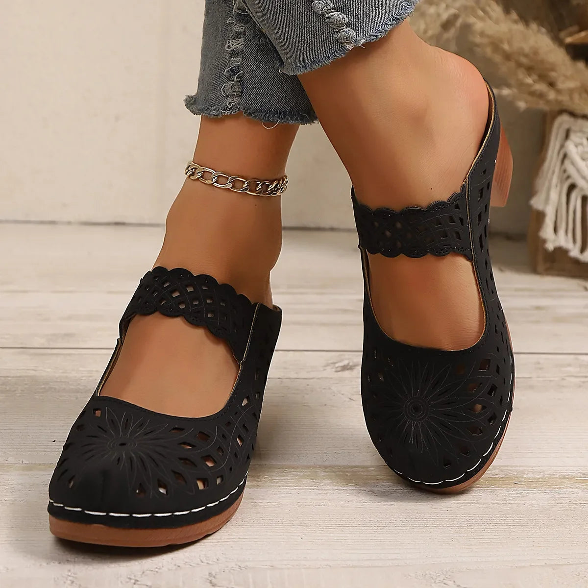 Hollow-Out Block Heels Sandals showcasing cutouts and a comfortable design for stylish outings.