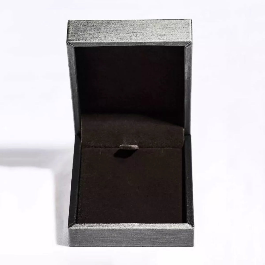 Open black jewelry box with a plush interior, perfect for displaying a 925 sterling silver pendant necklace.