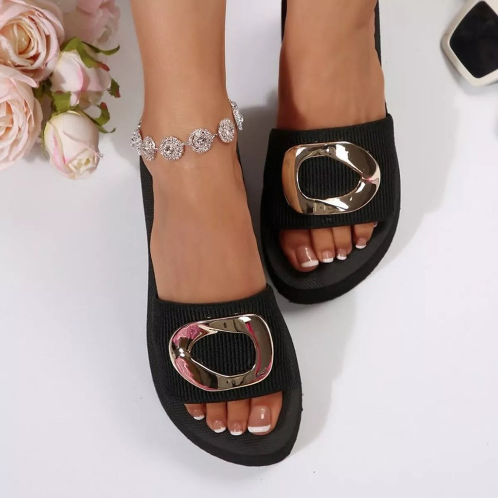 Open toe platform sandals with metallic buckle, perfect for stylish summer looks and comfortable wear.