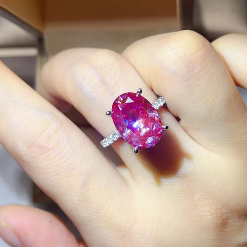8 Carat Moissanite Oval 925 Sterling Silver Ring on a hand, showcasing its brilliance and elegance.