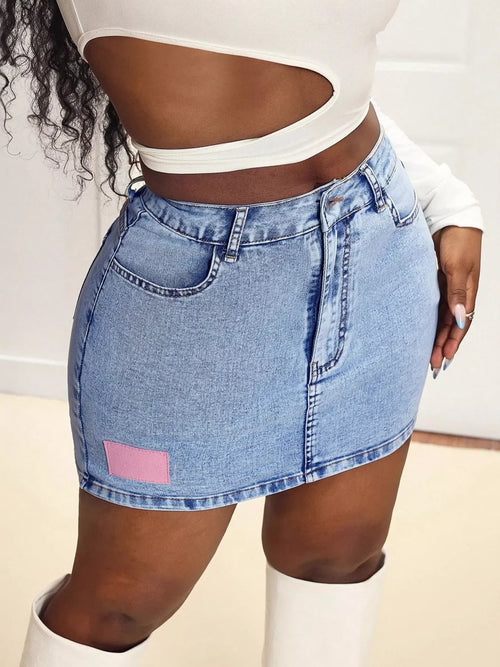 Blue High Waist Mini Denim Skirt showcased on a model, featuring a vibrant blue shade and stylish design.