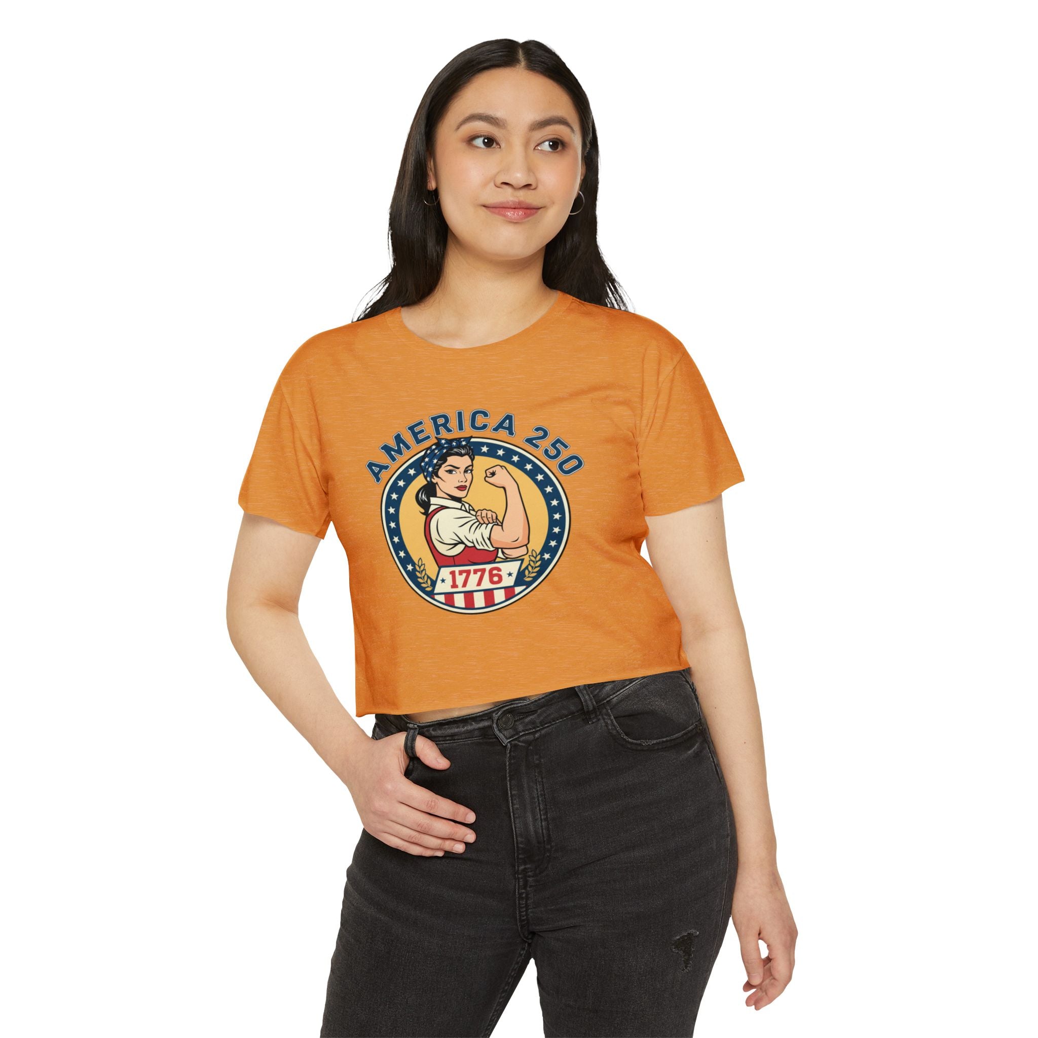 1776 Women's Clothing— 'America 250' Rosie-Inspired Patriotic Crop Top in orange worn by a young woman.