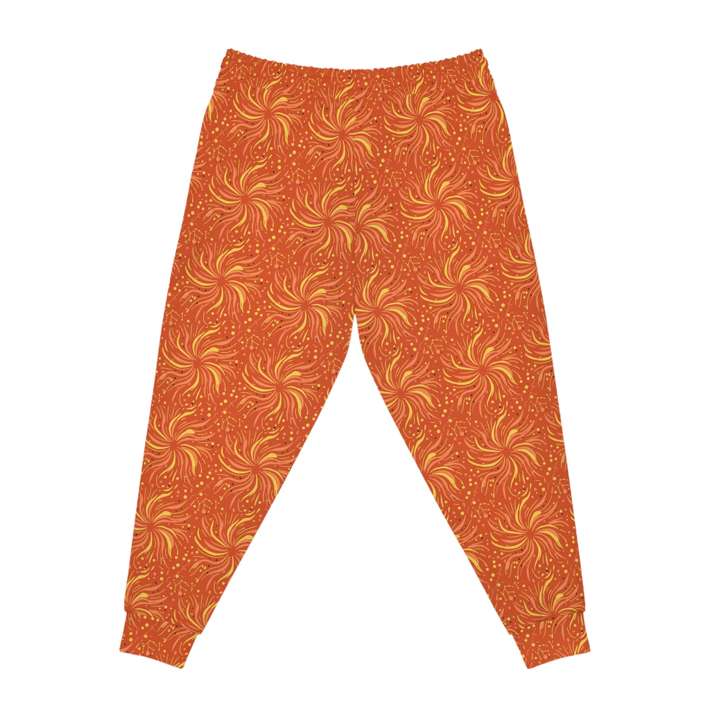 Sunset Shimmer Women's Joggers in vibrant sunset-orange with energetic sunburst design.