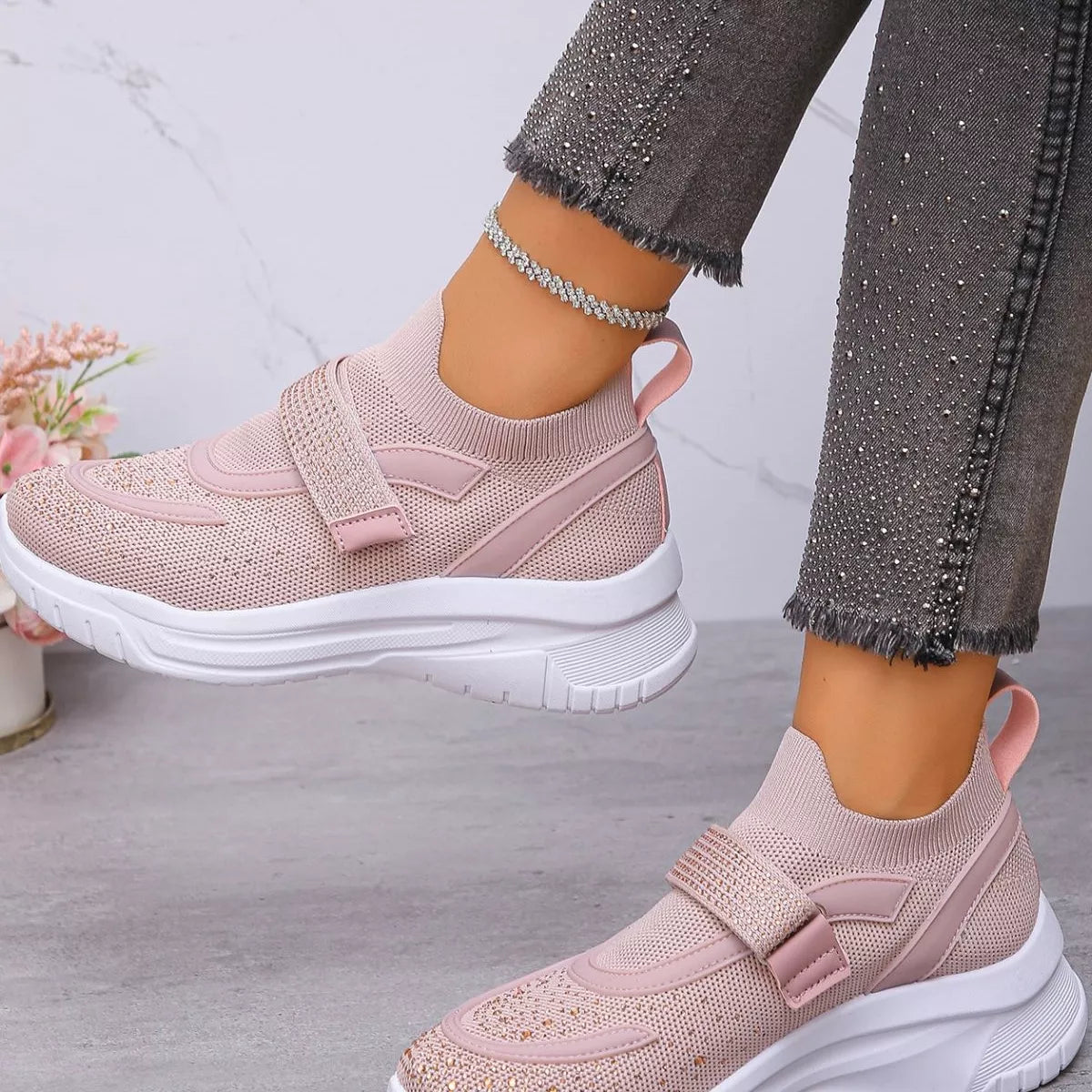 Stylish mesh sneakers with round toe in light pink color, showcasing a comfortable fit and breathable design.