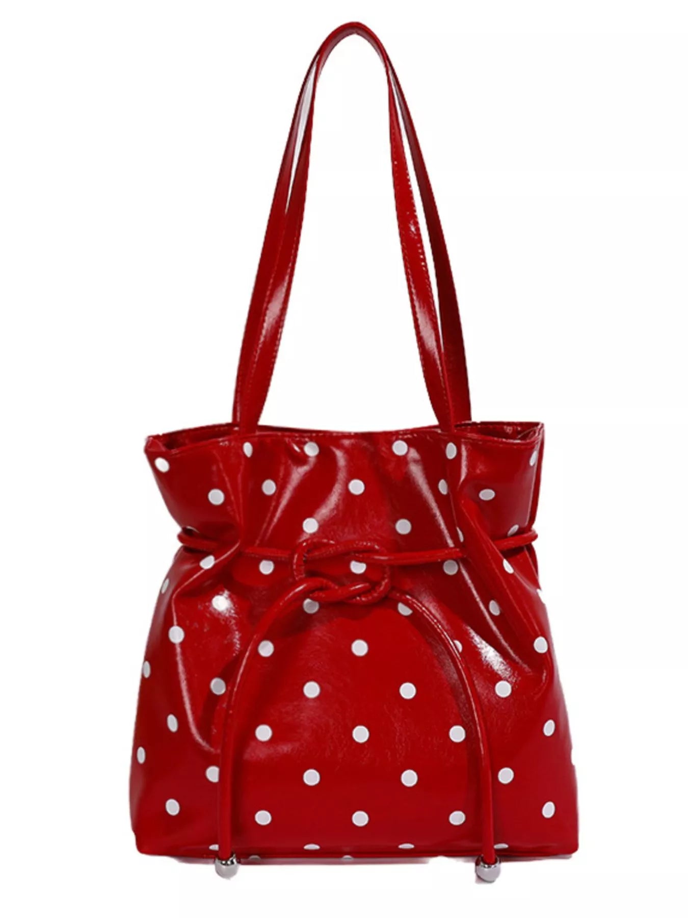 Red polka dot bag over shoulder made from durable PU leather, perfect for casual and formal events.
