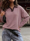 Vintage striped polo shirt long sleeve top styled with denim, perfect for casual outings.