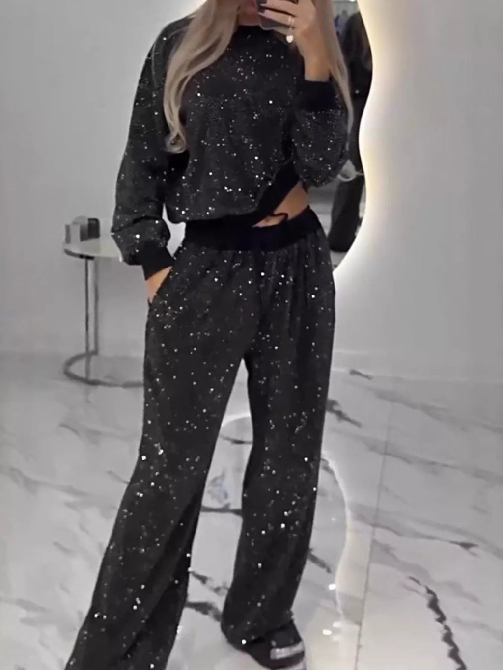 Rhinestone long sleeve top and pants set showcasing a stylish two-piece outfit with a slightly stretchy fit.