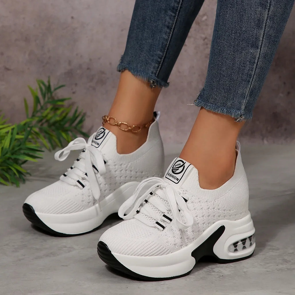 Lace Up Platform Sneakers in white, featuring a bold platform sole and classic lace-up design for a trendy look.