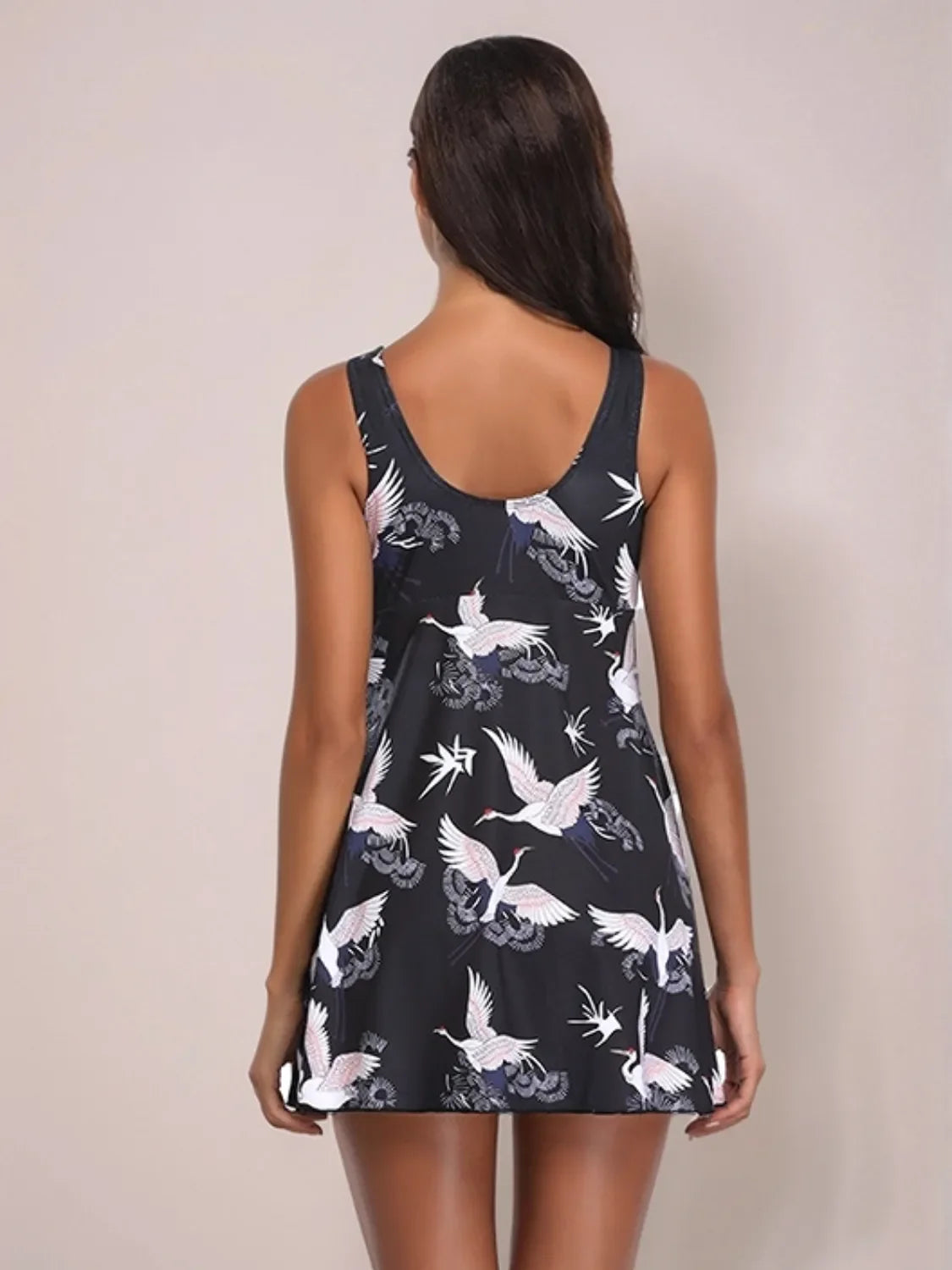 Full Size Printed Slit Plunge One-Piece Swimwear Plus Size with stylish bird print from the back view