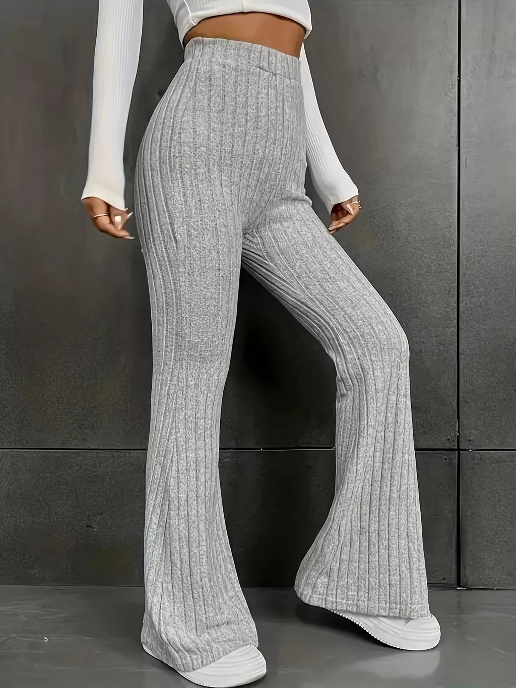 Plus Size Ribbed Knit High Waist Flare Pants in grey, featuring ribbed fabric and flared legs for a stylish look.