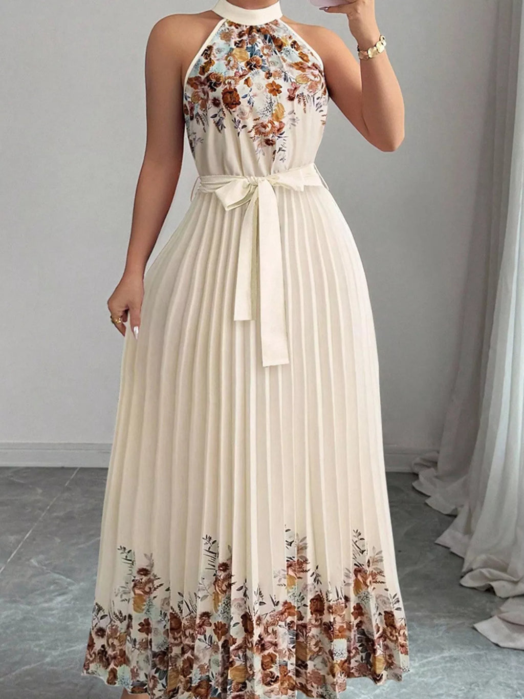 Summer Maxi Dress featuring a halter neck and floral print pleated design, perfect for warm-weather occasions.