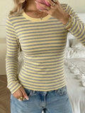 Slim-Fit Striped Long Sleeve T-Shirt worn by a model, showcasing its comfortable fit and stylish design.