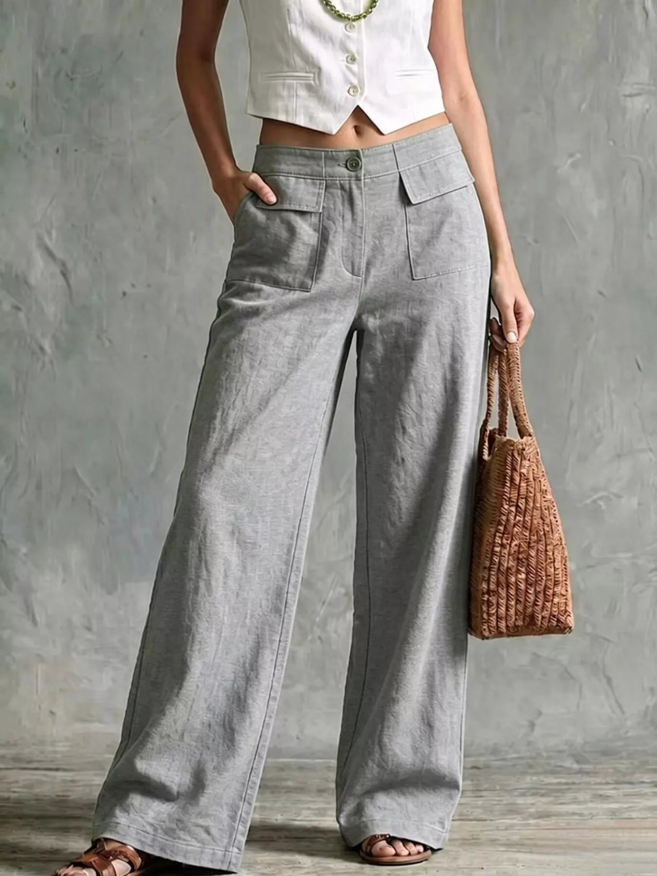 Plus size wide leg pants in gray, featuring a relaxed fit, perfect for casual or dressy occasions.