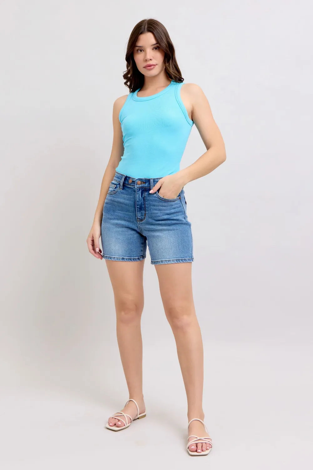 Plus Size Denim Shorts (S–3XL) | 2-Button Stretch Shorts in light blue tank top, showing stylish summer outfit.