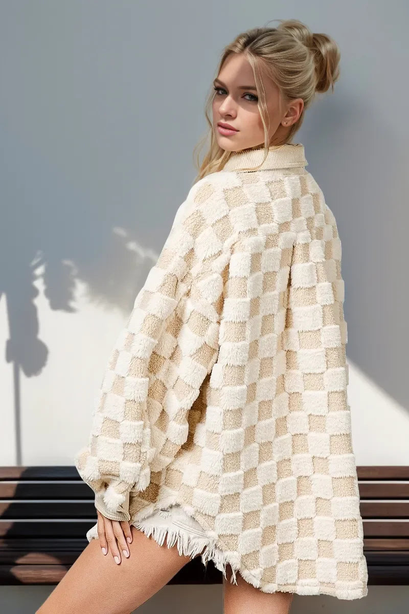 Fuzzy Button Up Checkered Shacket worn by a model, showcasing its cozy fabric and stylish checkered pattern.