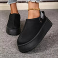 Stylish suede boots with platform sole and fur lining, perfect for casual and chic outings.