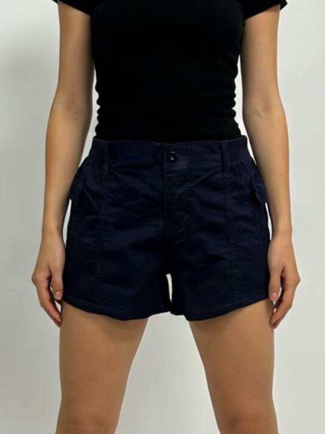 Casual Pocketed Shorts in navy color featuring stylish pockets and a comfortable fit.