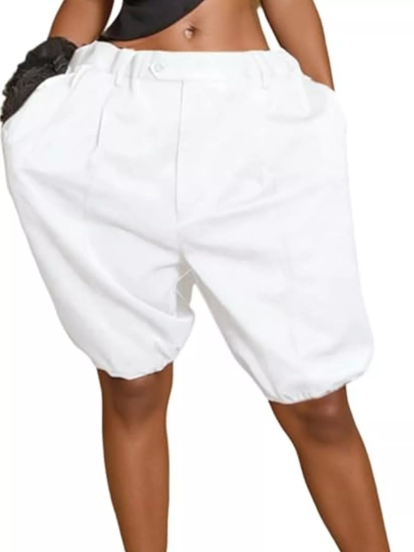 Women's pleated shorts in white, high waisted design featuring pockets and a comfortable fit for warm weather.