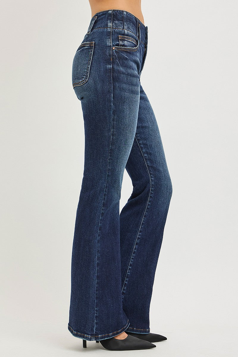 Dark Blue High Rise Flare Jeans With Seam Detail Waistband showcased from the side, highlighting the fit and style.
