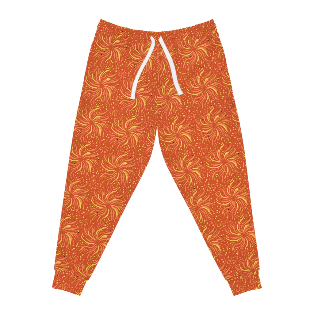 Sunset shimmer women's joggers featuring a vibrant sunset-orange color and energetic sunburst design.