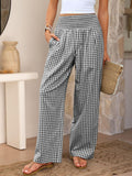 Gingham High Waist Wide Leg Pants displayed on a model, featuring a smocked waistband and casual style.
