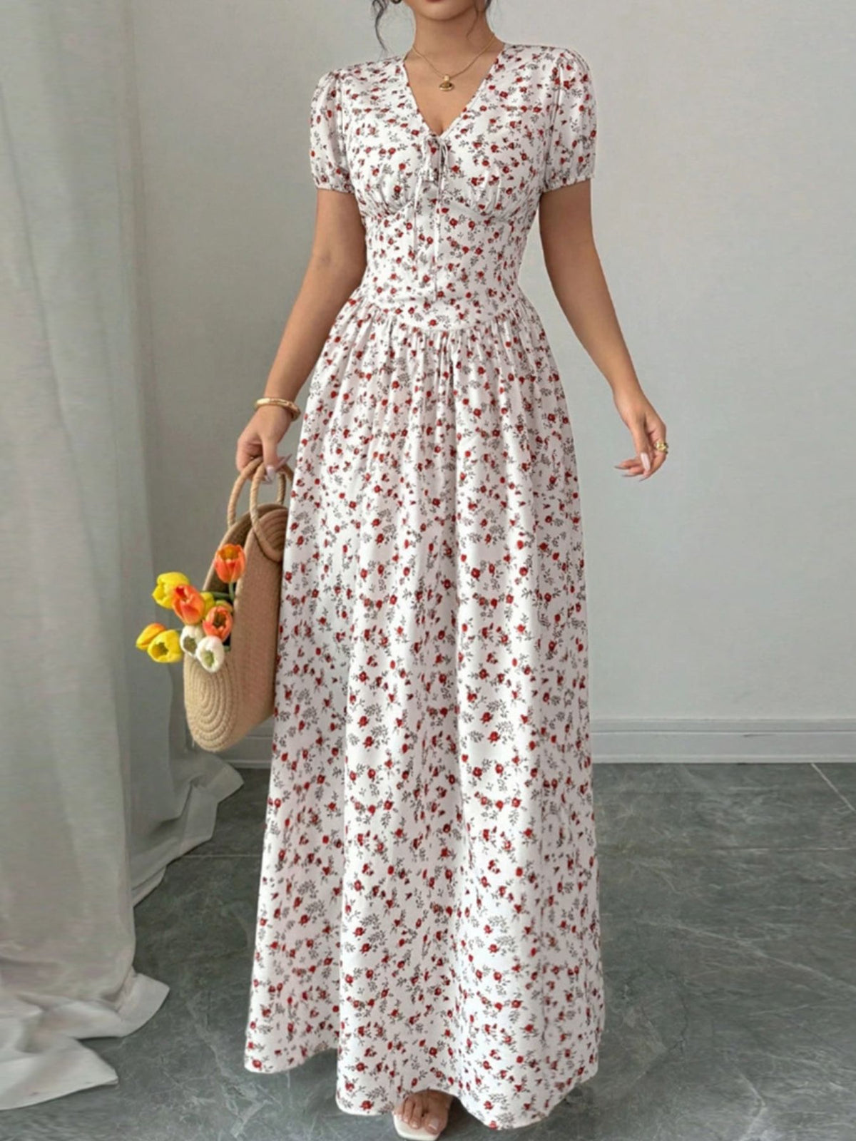 Floral Print V-Neck Maxi Dress worn by a model, showcasing its elegant floral design and flattering fit.
