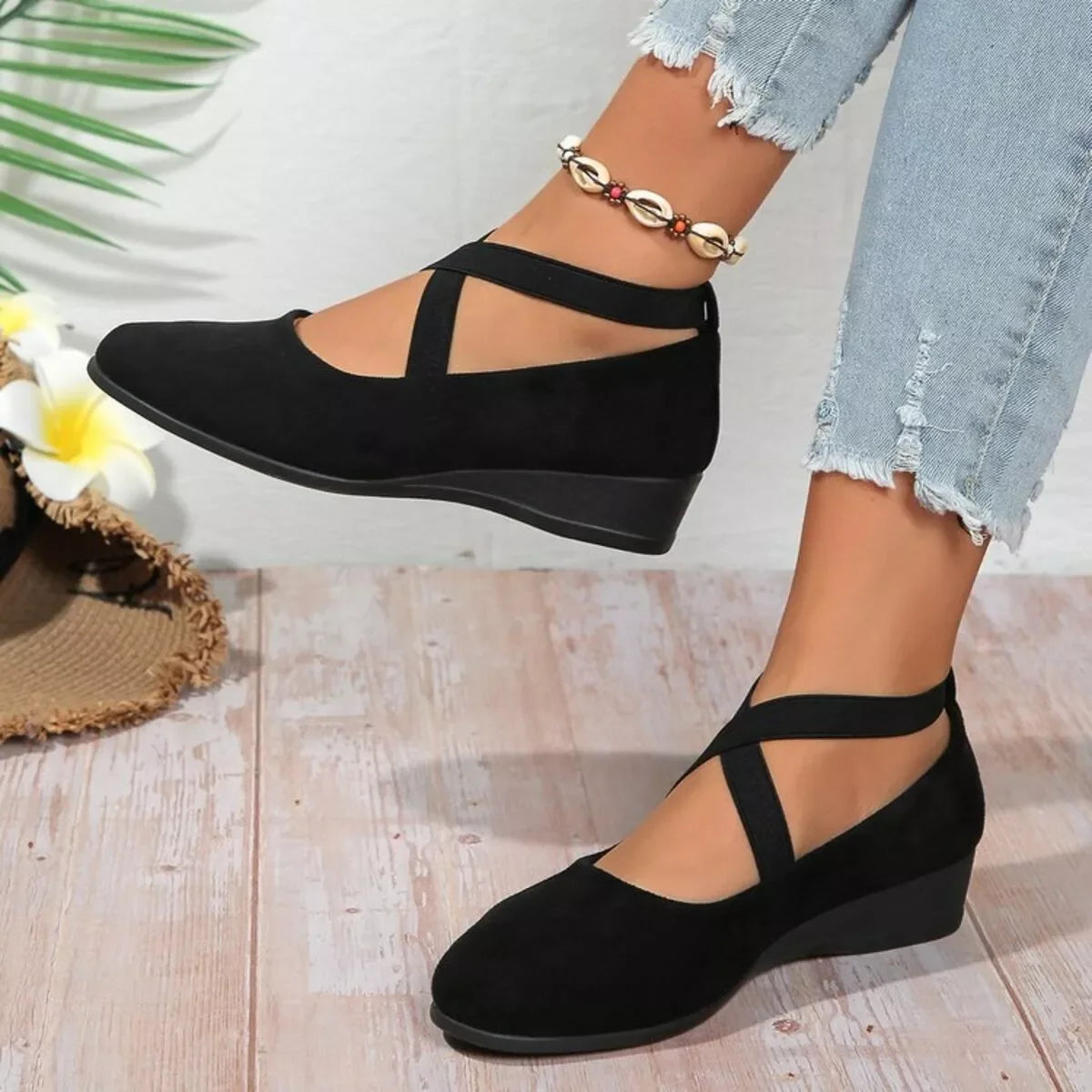 Round Toe Wedge Loafers in black with ankle straps, showcased in a casual setting.