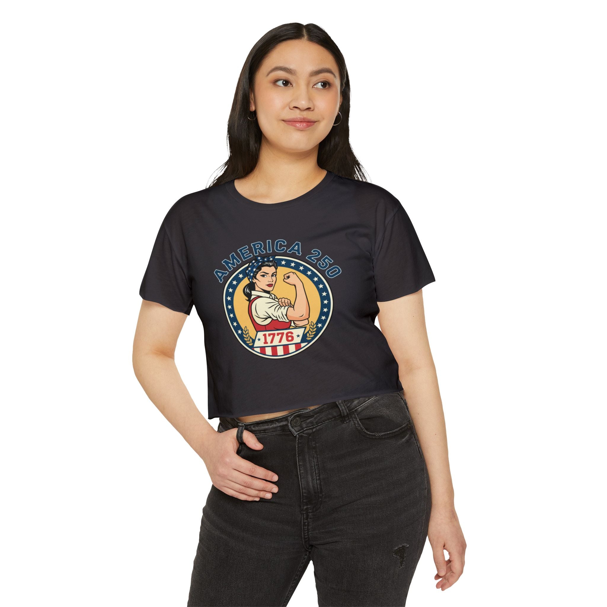 Woman wearing the 1776 Women's Clothing— 'America 250' Rosie-Inspired Patriotic Crop Top, showcasing its vintage design.