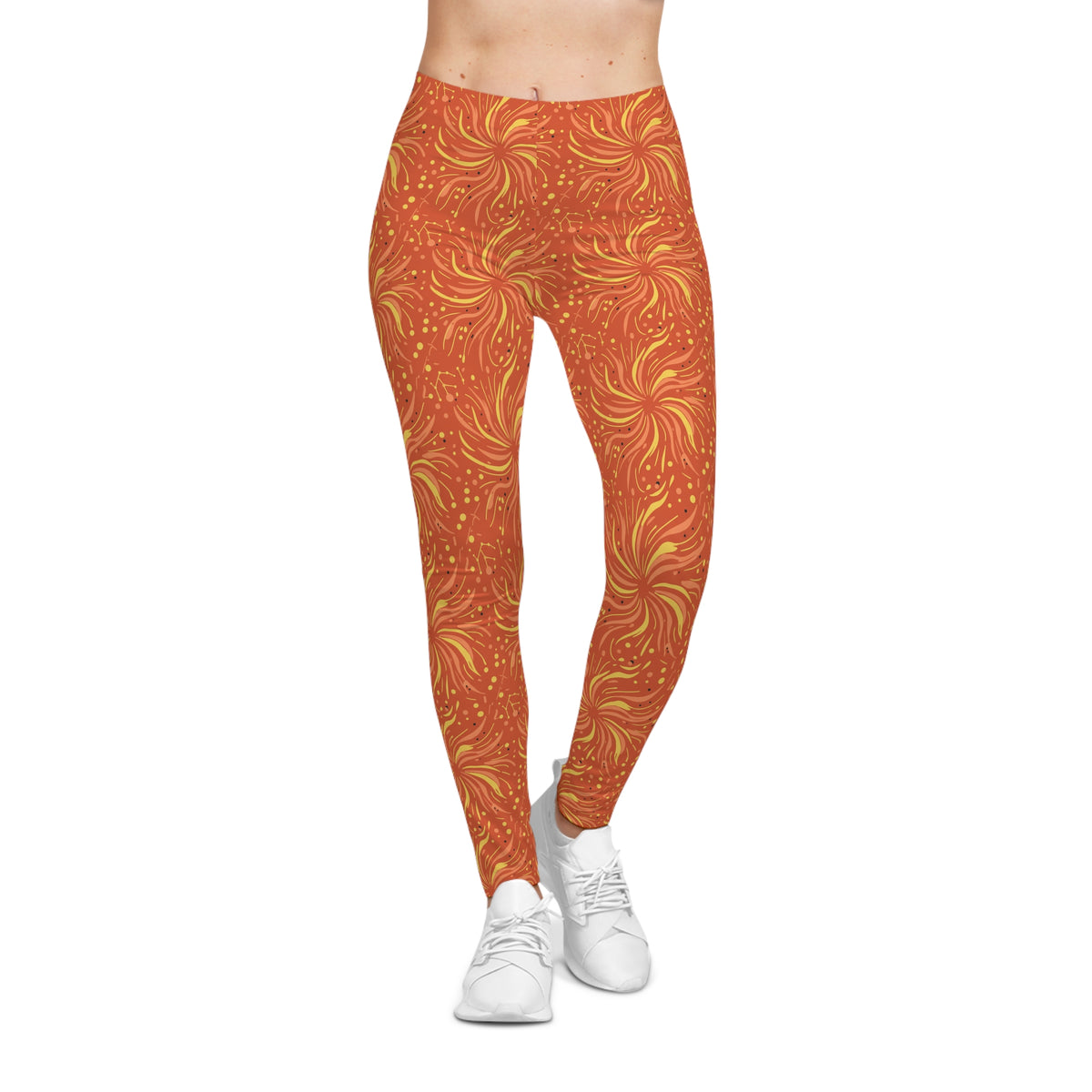 Woman wearing Leo constellation leggings with sunset-orange base and golden sunburst pattern.