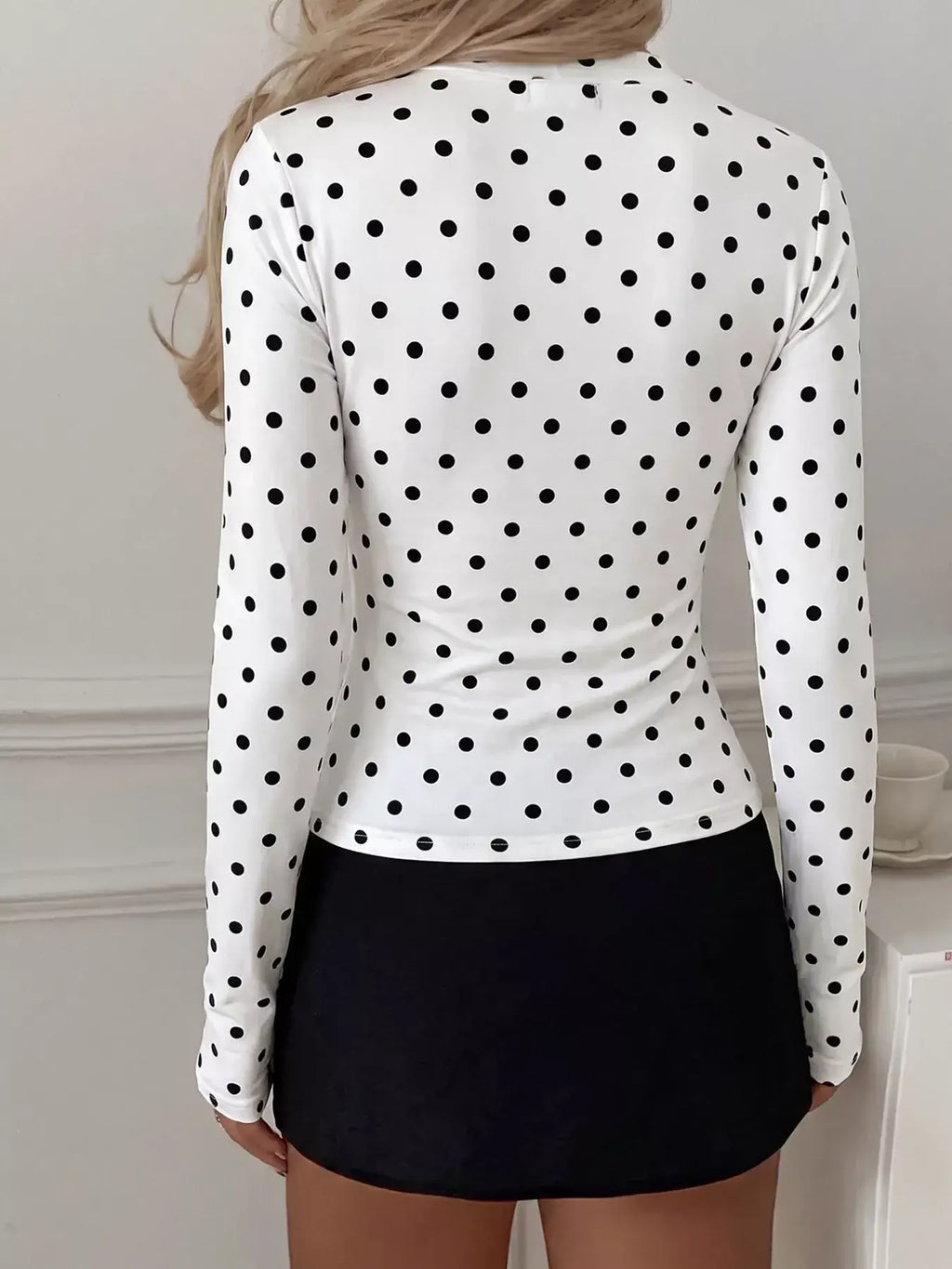 Back view of a Polka Dot Keyhole Slim Fit T-Shirt featuring a trendy design and long sleeves.