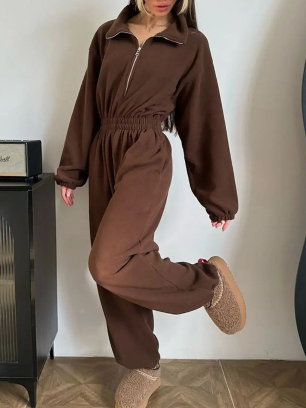 Women's jumpsuit zip front long sleeve in brown, showcasing a stylish look with long sleeves and comfy fit.