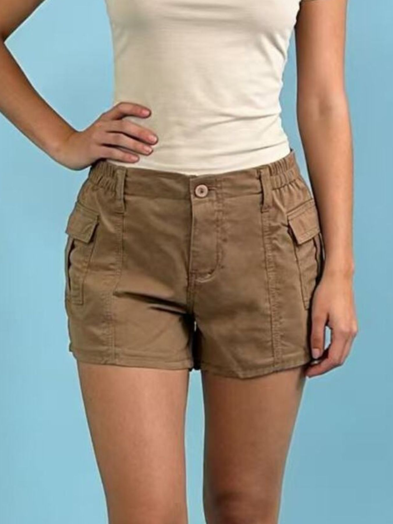 Casual Pocketed Shorts in brown, showcasing functionality and style with pockets and an elastic waistband.