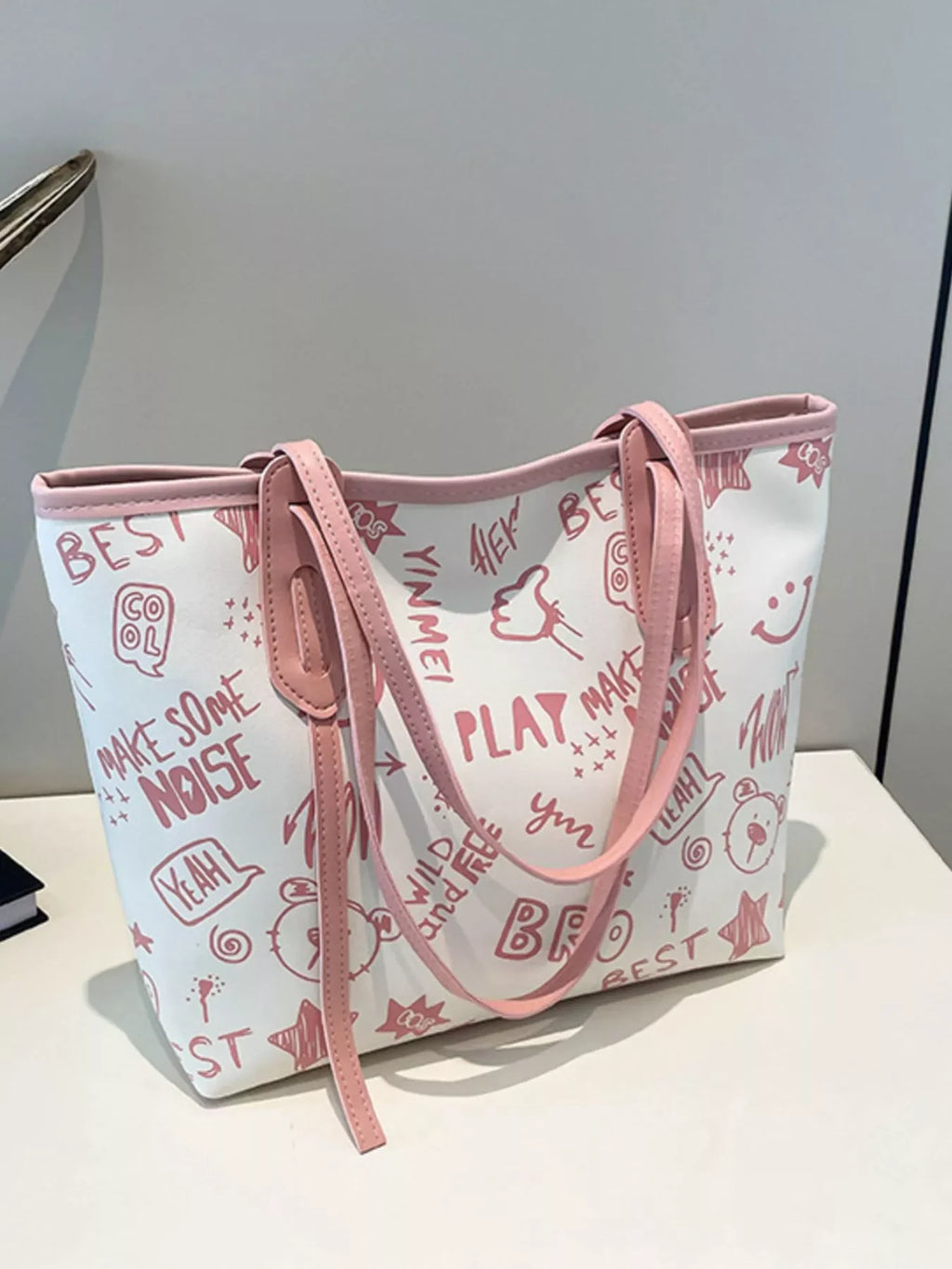 Graffiti Print Tote Bag – Large Canvas Shoulder Bag for Women with colorful street art design and pink straps.
