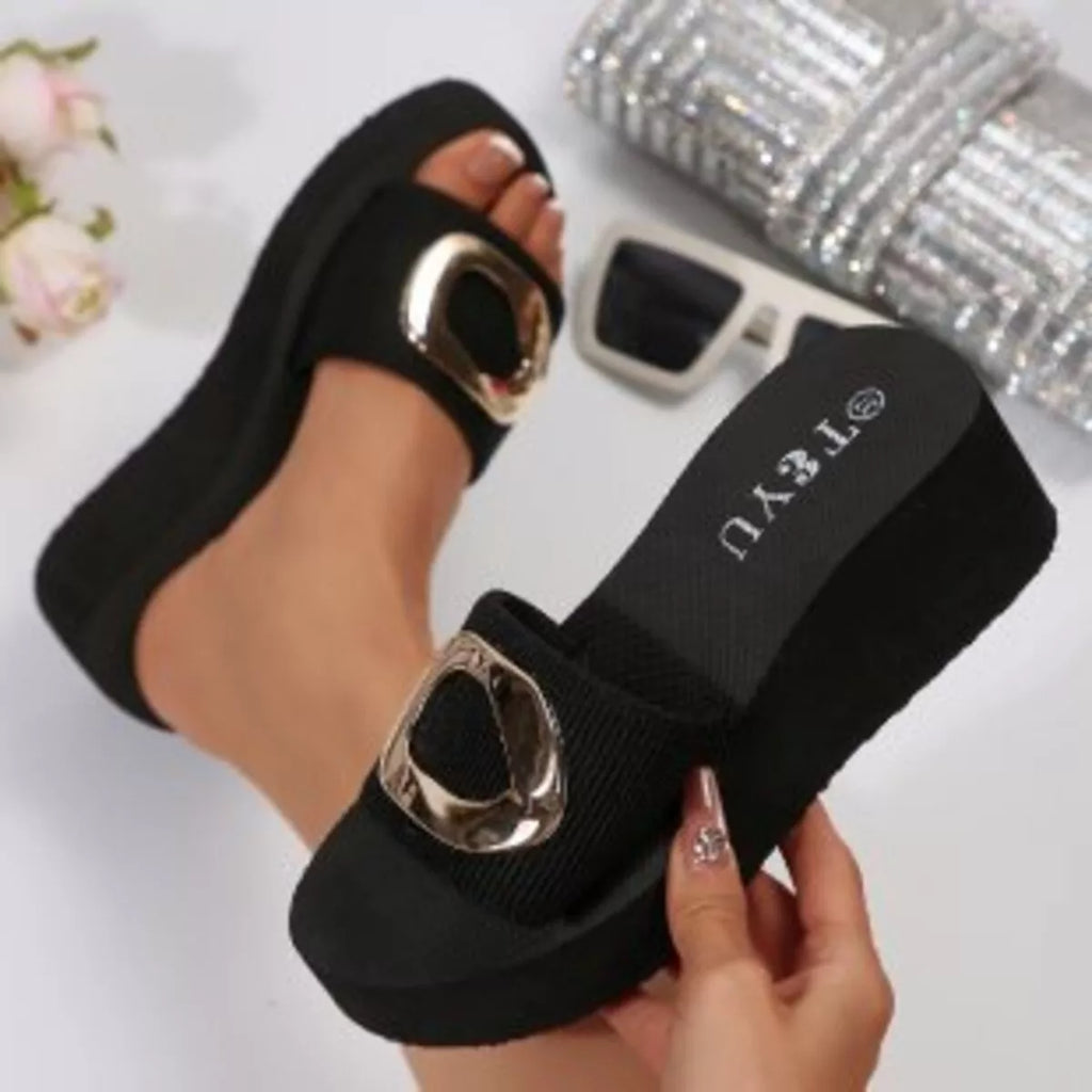 Stylish open toe platform sandals with a gold buckle, perfect for fashion-forward footwear collections.