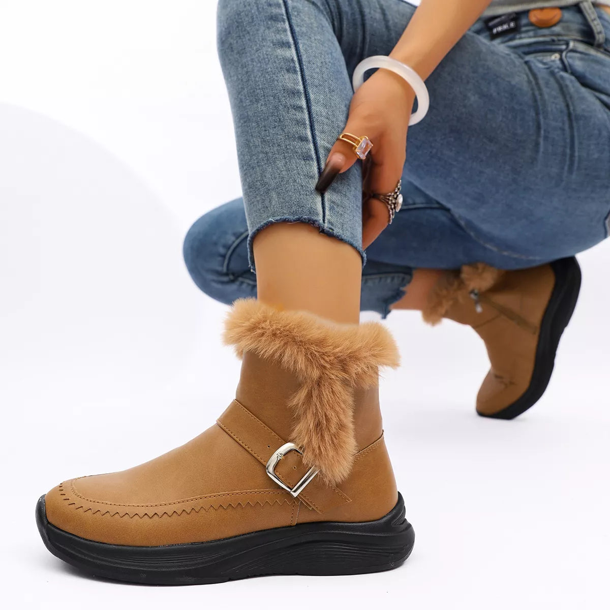 Ankle boots with fur lining featuring a chic faux fur trim and sturdy sole, perfect for stylish winter outfits.