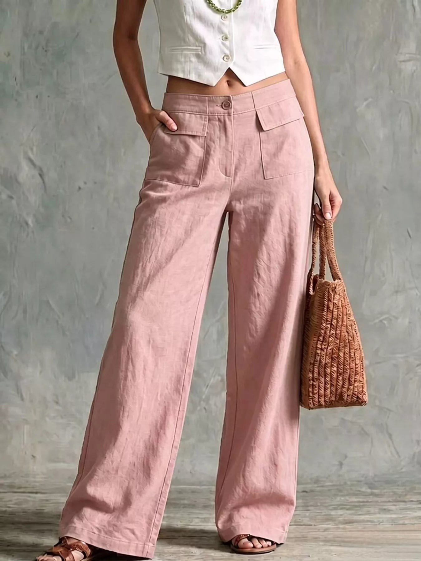 Stylish full size plus size wide leg pants in soft pink, perfect for casual and formal occasions.