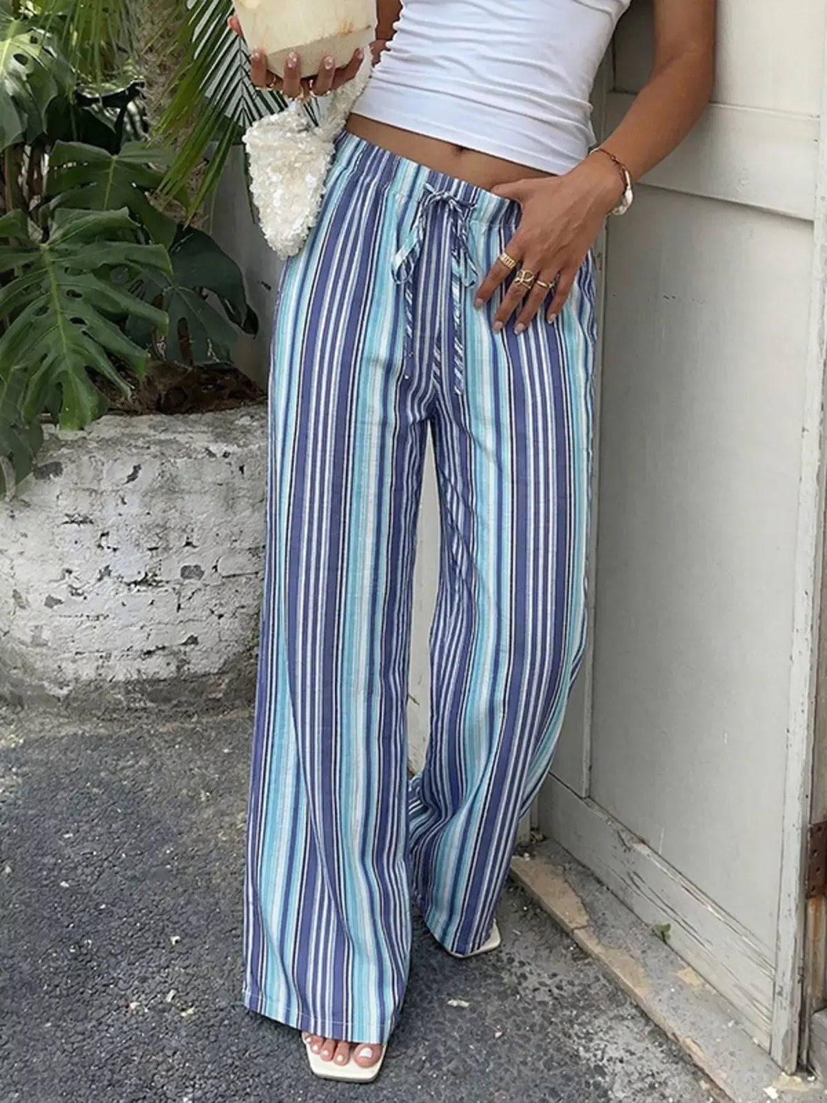 Striped Wide-Leg Pants (Midnight Blue) featuring a chic wide-leg silhouette in bold stripes.
