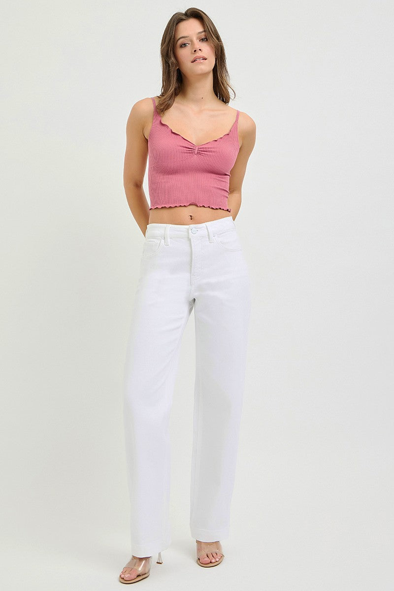 Model wearing French White Full Size High Rise Wide Baggy Pants Size Inclusive (0-3XL) with a pink crop top.