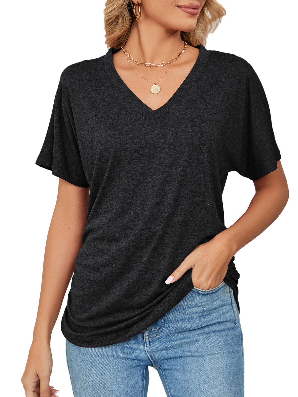 Casual V-Neck Short Sleeve T-Shirt in black worn with jeans, showcasing a stylish and comfortable fit for casual outings.