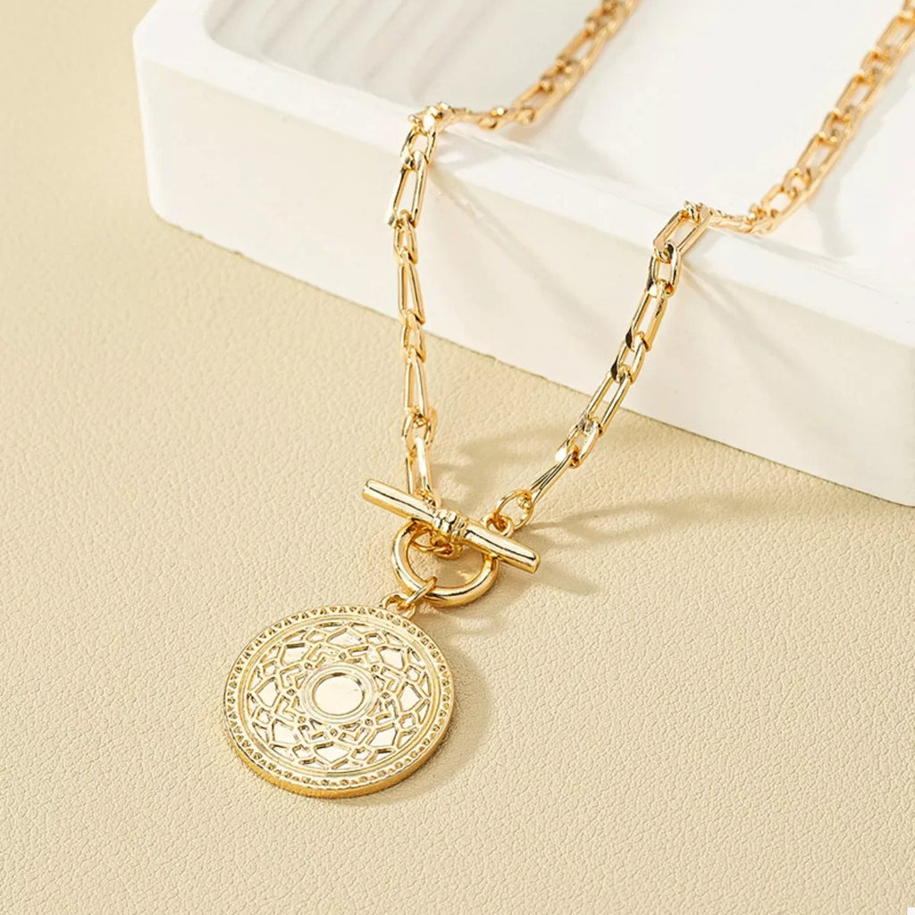 Chain Link Necklace with Vintage Coin Pendant featuring a gold-plated antique-inspired coin and bold links.