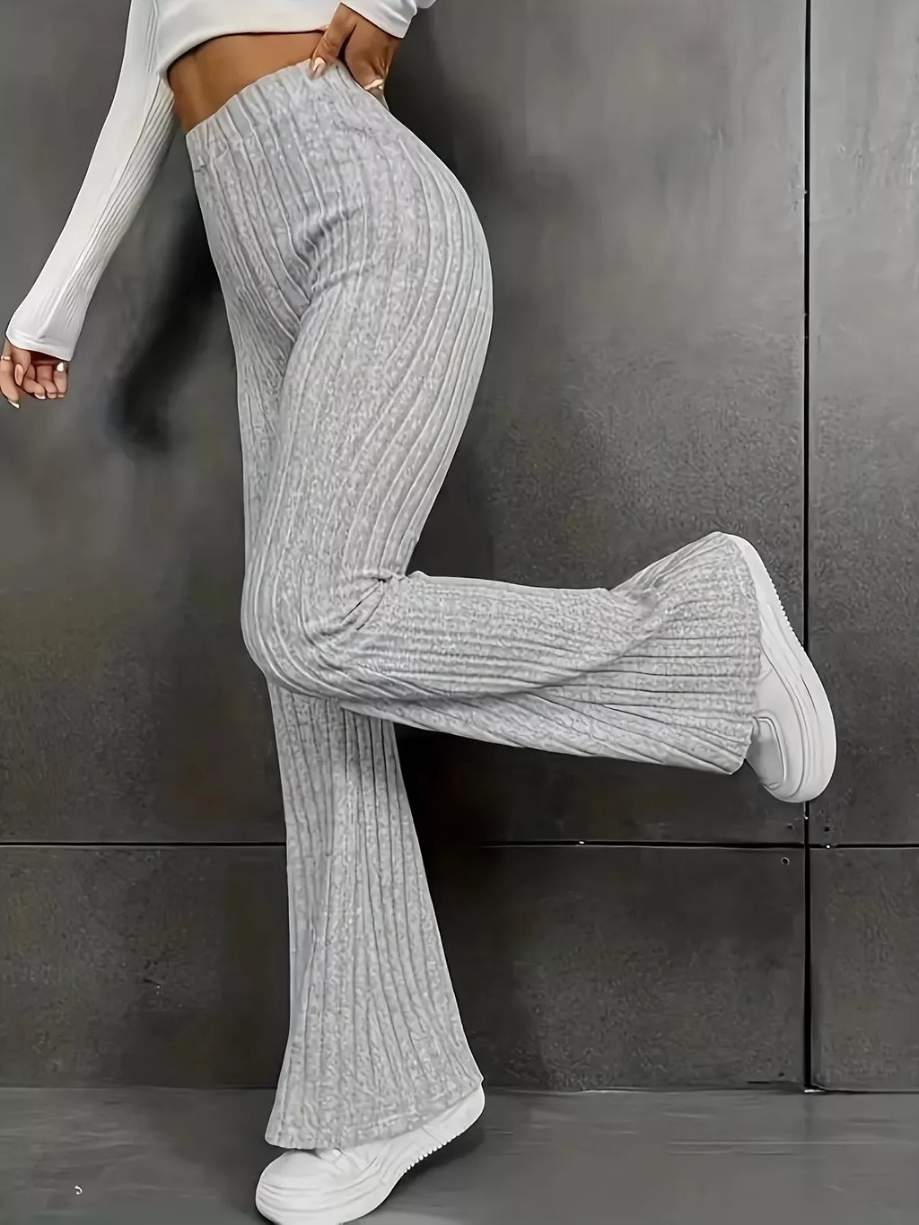 Plus Size Ribbed Knit High Waist Flare Pants in grey, showcasing ribbed texture and flared legs for a stylish fit.