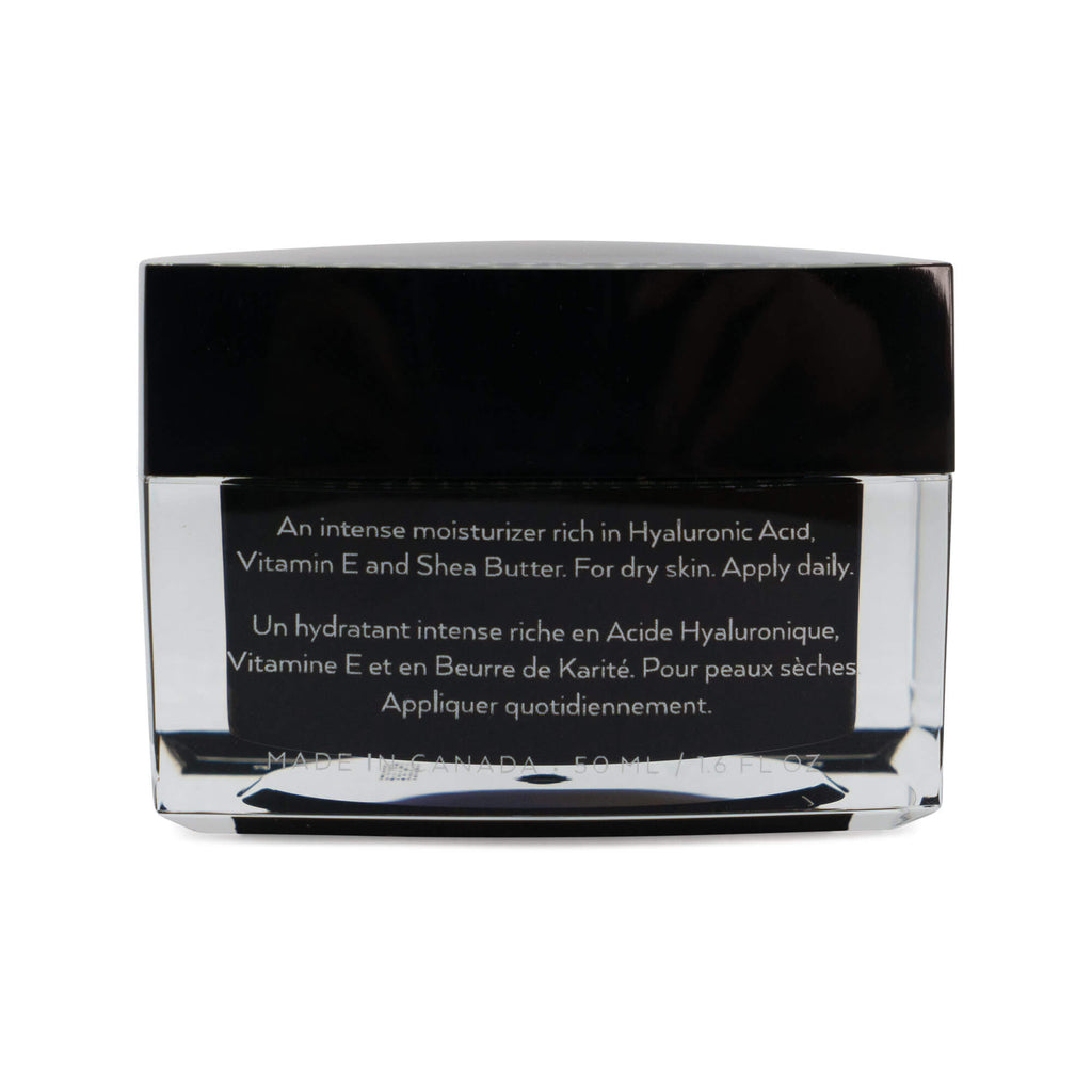 Hyaluronic Moisturizer For Dry Skin in a clear jar with a black lid, rich in hyaluronic acid and shea butter.