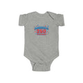 Patriotic baby onesie featuring America 250 design with bright colors and fireworks on a gray background.