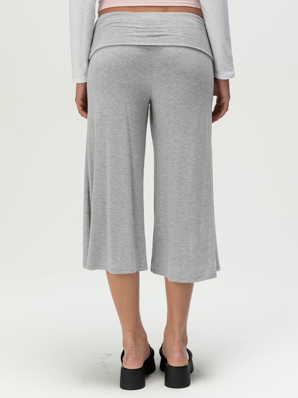 Back view of a woman wearing Wide Leg Capris in gray, showcasing comfort and style.