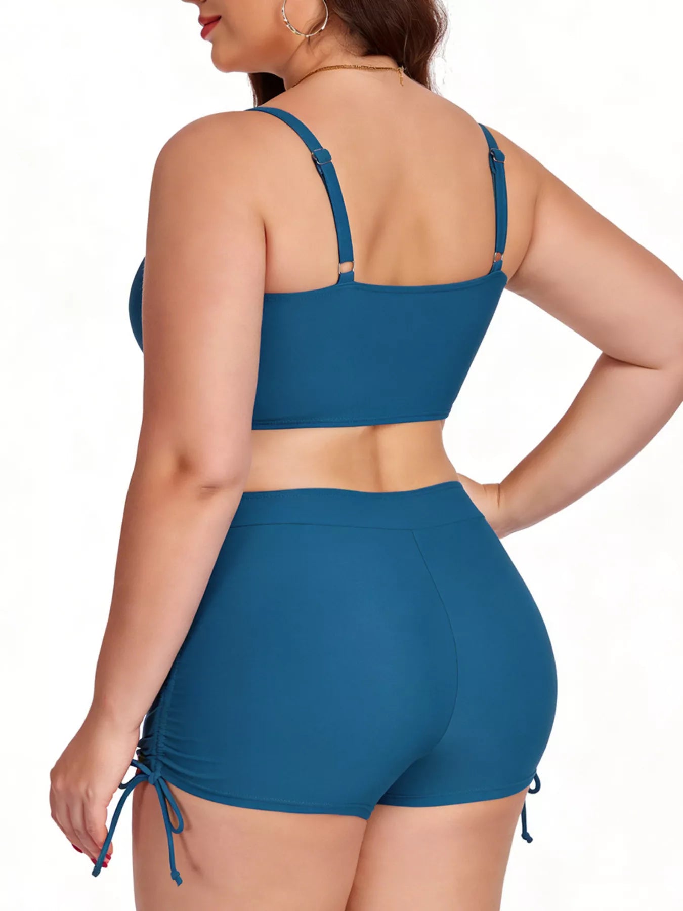 Plus size bathing suit ruched drawstring back view with adjustable straps and stretchy fabric.