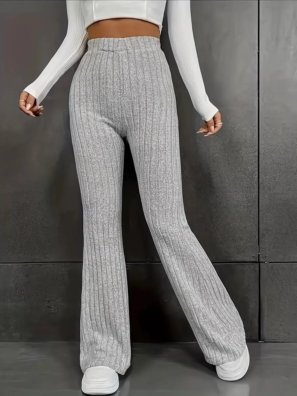 Plus Size Ribbed Knit High Waist Flare Pants shown in grey ribbed fabric, perfect for casual or dressed-up looks.