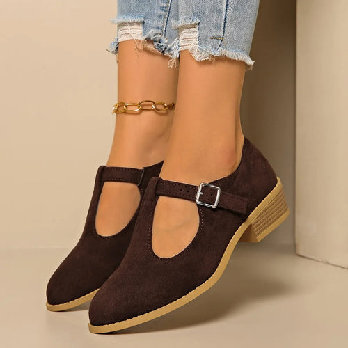 Classic Suede Block Heel Slip-Ons featuring a stylish dark brown design and comfortable block heel.